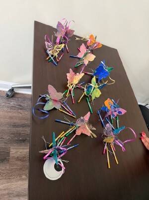 A table of butterfly windchimes.